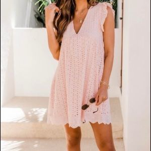 Eyelet lace, babydoll style dress with shorts underneath!